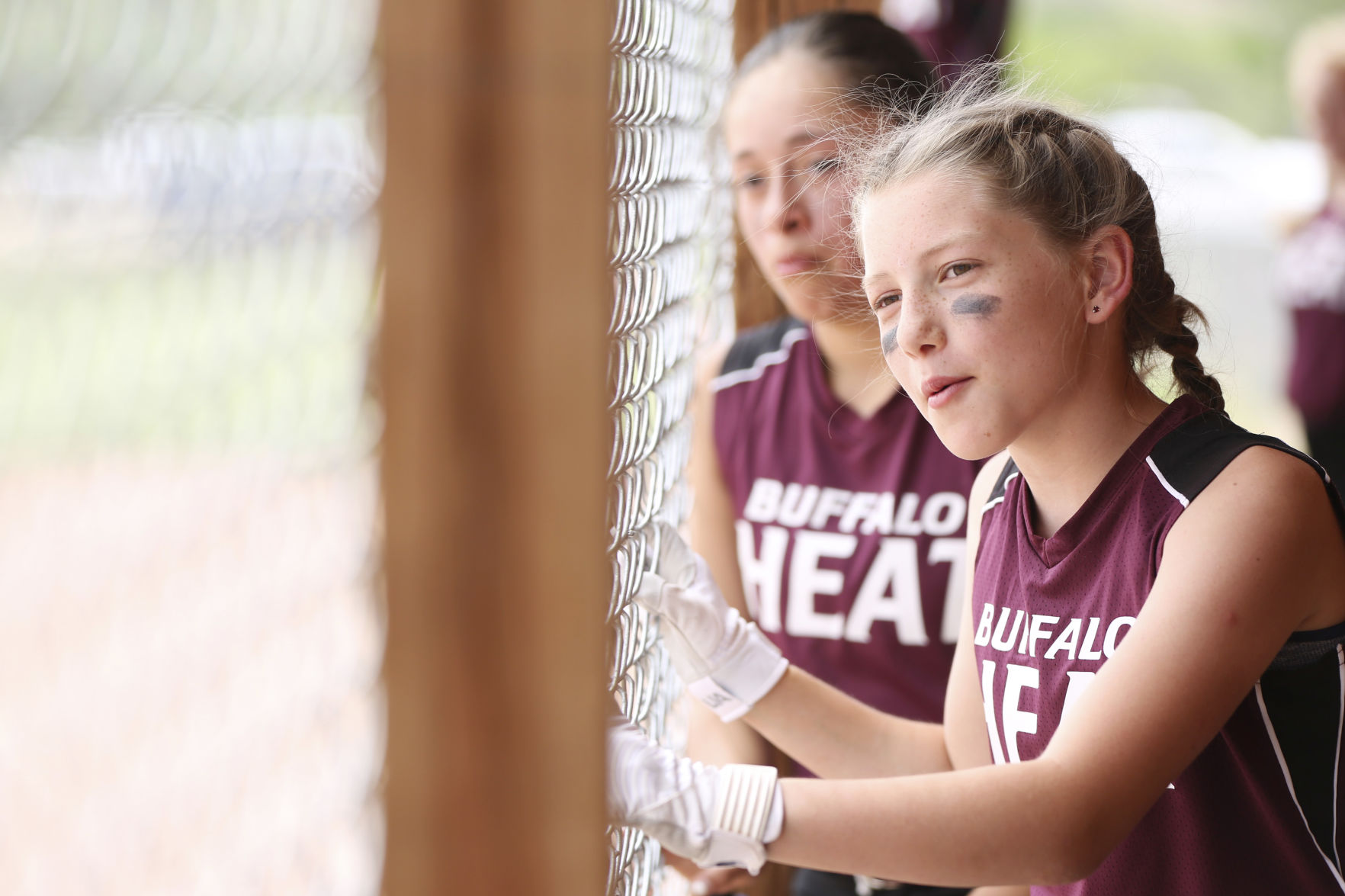Ava Teten cheers for Buffalo’s batter during the first inning of their scrimmage